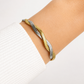 Two-tone double snake bracelet worn on wrist