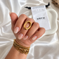 Drea gold statement ring with sculptural open center design
