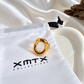 Drea non-tarnish gold ring styled with XMTX Collections jewelry