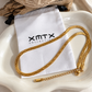 Embossed Herringbone Necklace styled with XMTX Collections jewelry pouch, waterproof non-tarnish gold jewelry