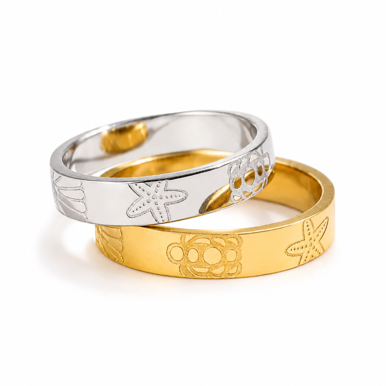 Forever Summer Ring in gold and silver featuring a repeating sun, turtle and starfish pattern