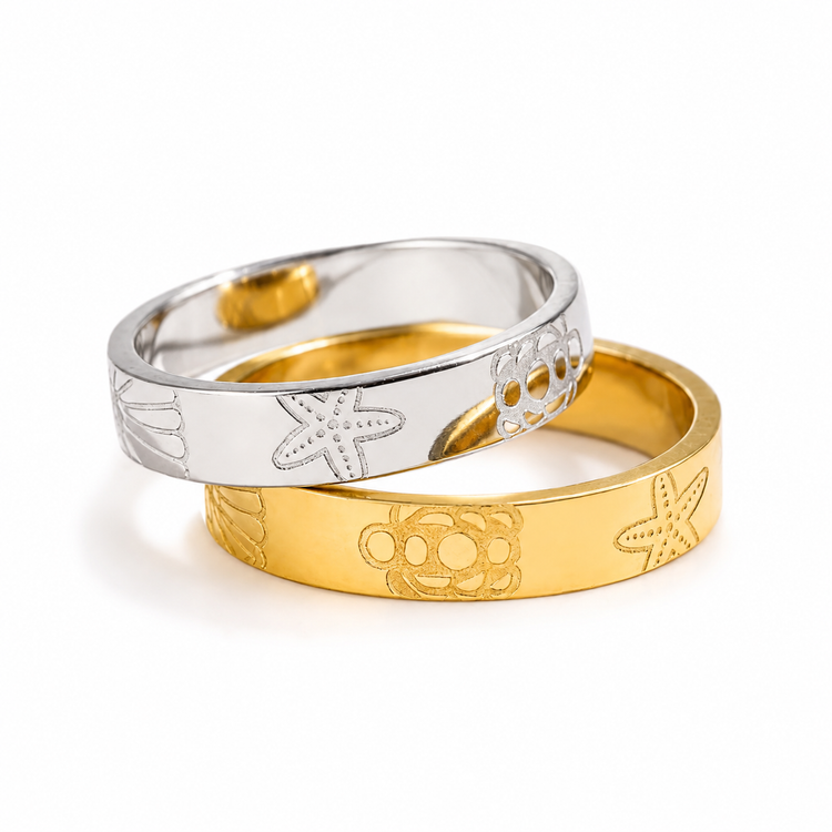 Forever Summer Ring in gold and silver featuring a repeating sun, turtle and starfish pattern