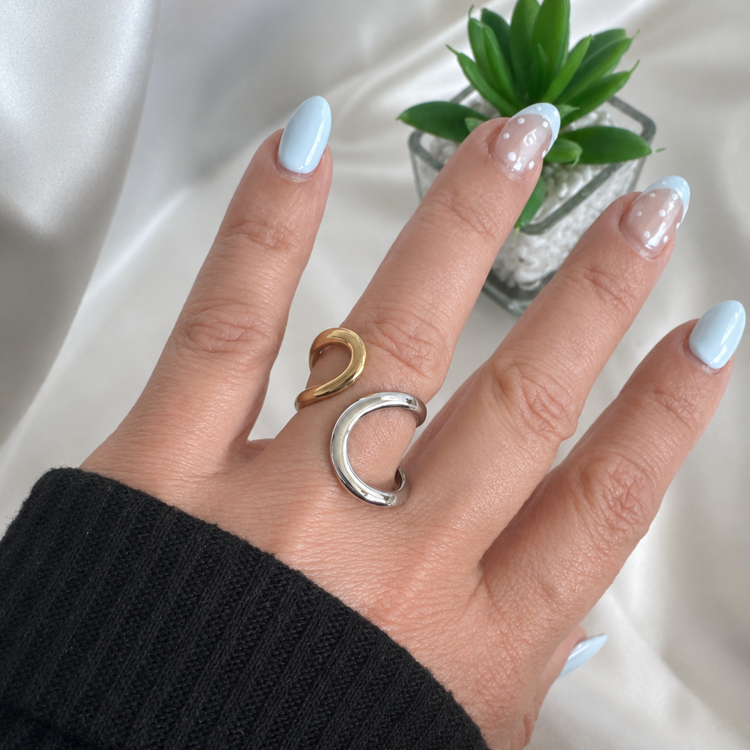 Close up of June Two Tone Open Ring styled on hand with minimalist aesthetic