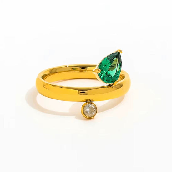 Gold pear cut emerald ring on white background waterproof tarnish resistant jewelry XMTX Collections
