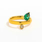 Gold pear cut emerald ring on white background waterproof tarnish resistant jewelry XMTX Collections
