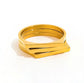 Lauren gold layered band ring on white background, waterproof stainless steel jewelry