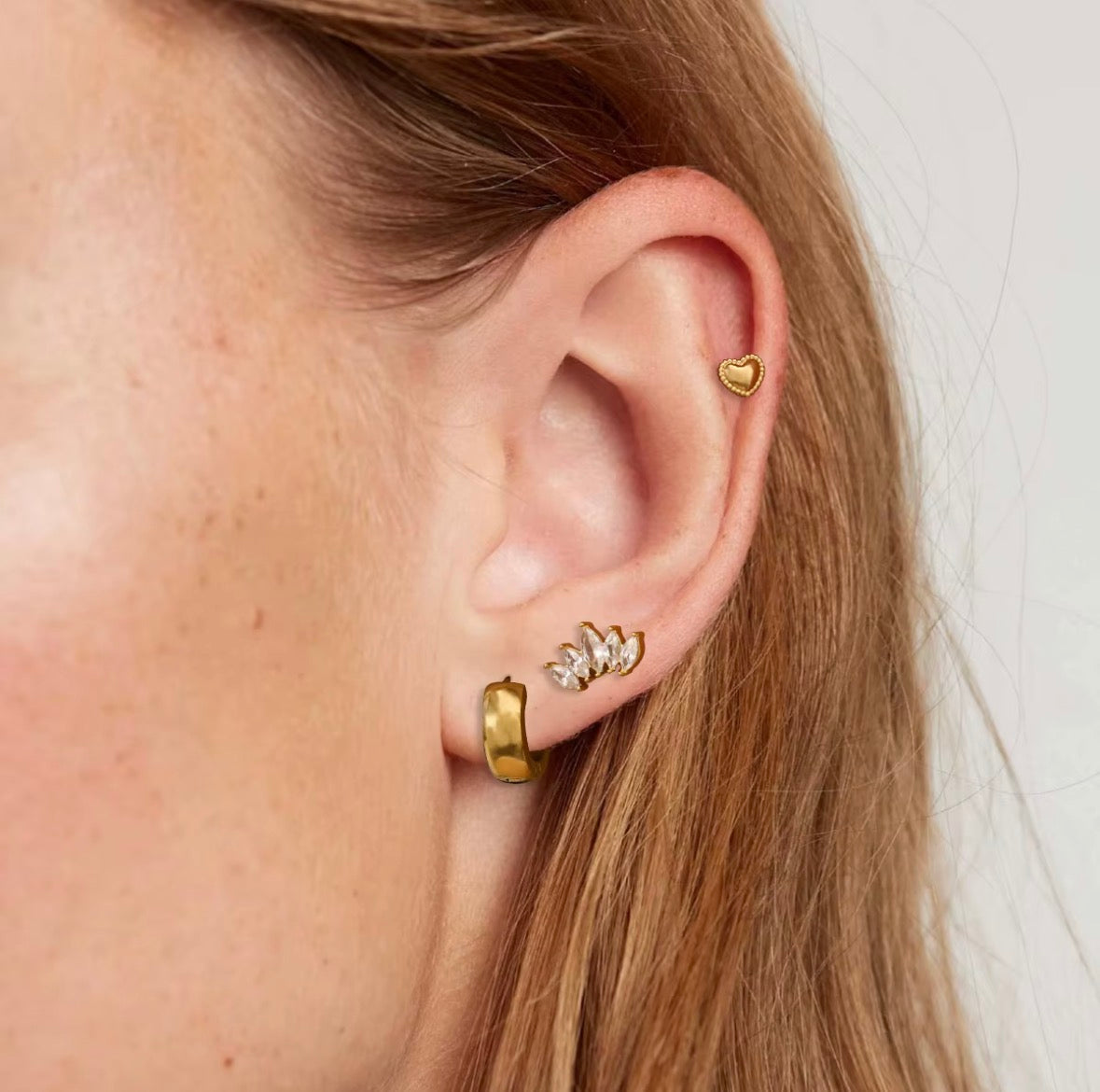 Lilly three stack earrings worn together in an ear stack