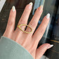 Liv Ring gold open wrap adjustable statement ring on hand