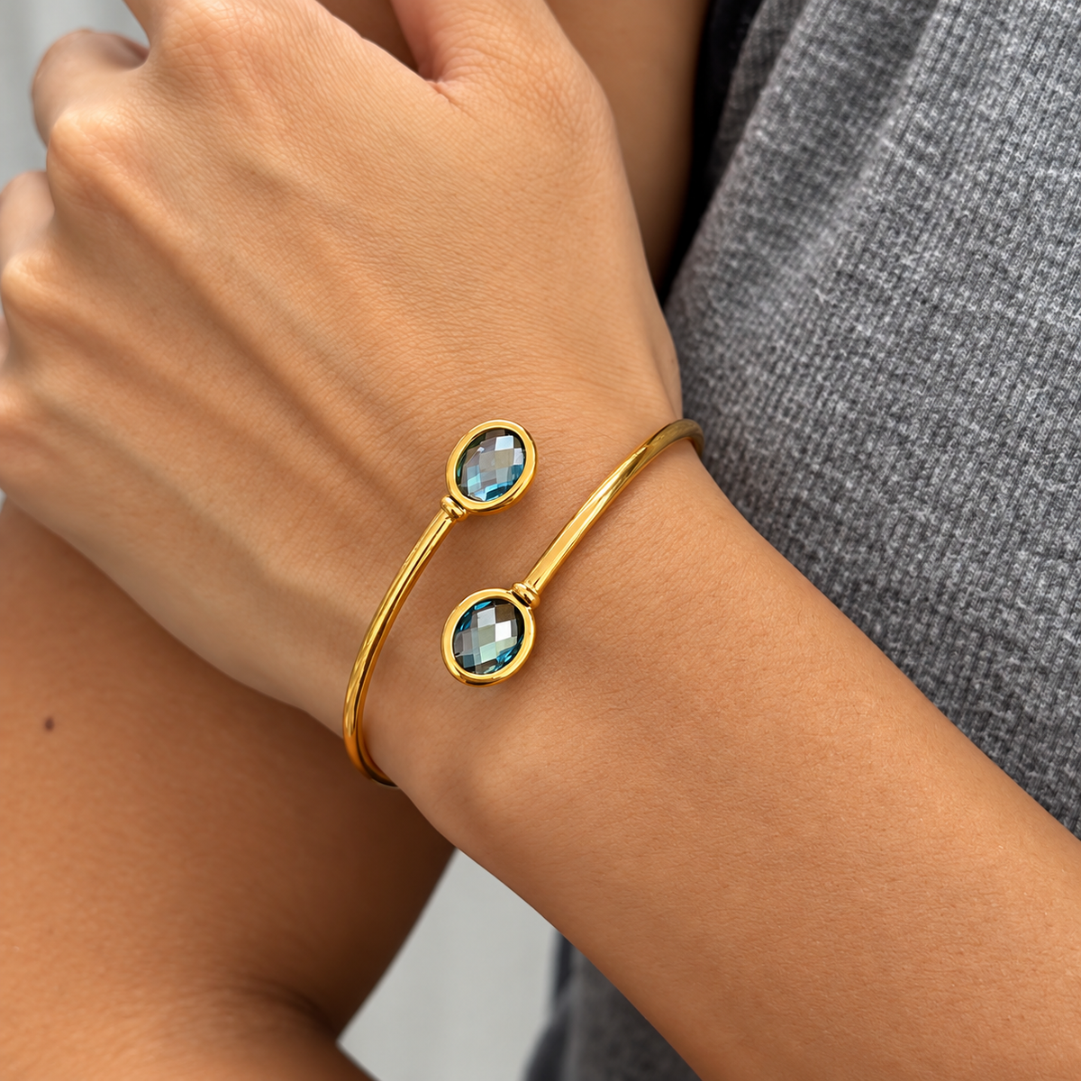 London Blue bangle bracelet worn on wrist