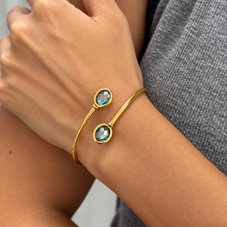 London Blue bangle bracelet worn on wrist