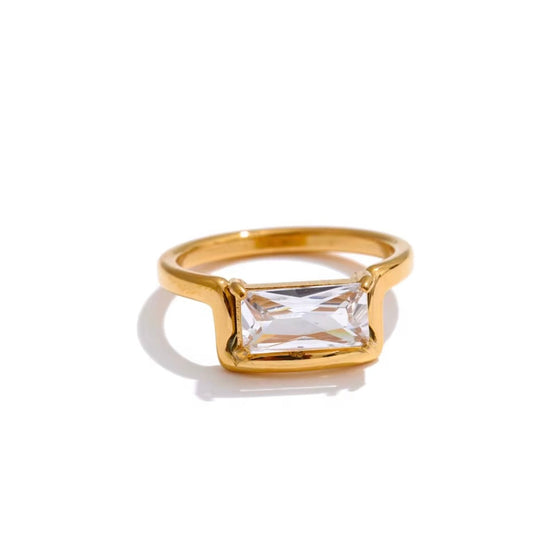 Gold baguette ring on white background – Macy Ring by XMTX Collections