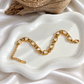 Nedda gold chain bracelet with sparkling triangular details