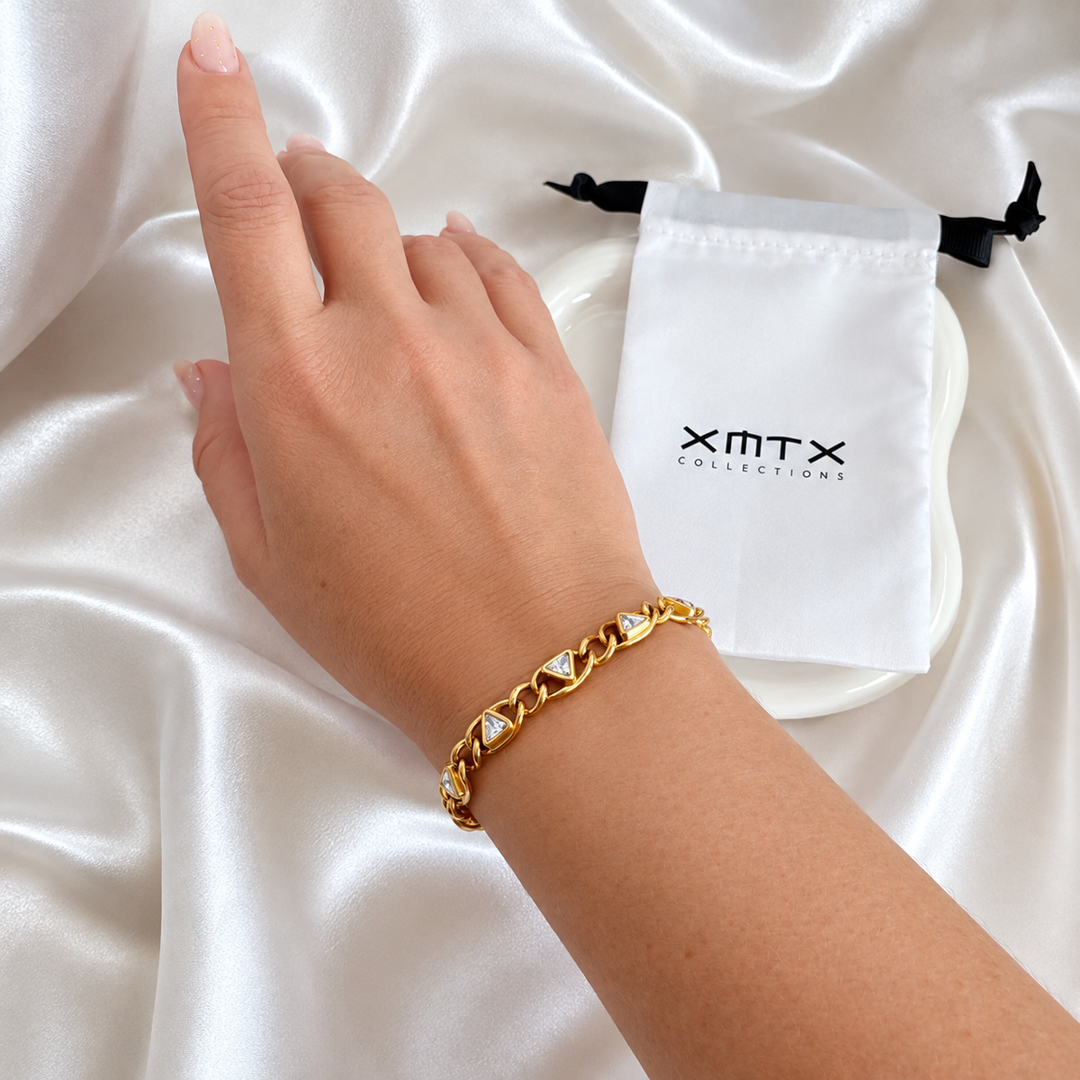 Nedda non-tarnish gold chain bracelet styled on wrist