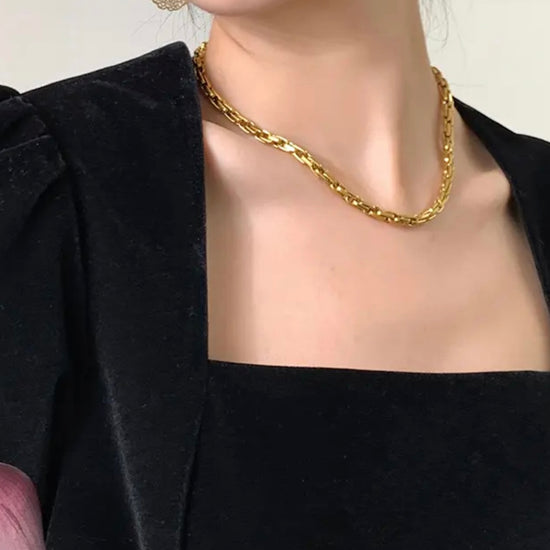 Introducing the Nora Luxury Woven Necklace, a one-of-a-kind piece that exudes strength and beauty. Made with high-quality materials, this necklace offers a luxe touch to any outfit. A must-have for those seeking a unique and sophisticated accessory.

Made to last!&nbsp;Tarnish and Water Resistant, Hypoallergenic

6mm wide

16 inches long + 2 Inches Ext

Closure :Lobster Clasp




18k Gold Plated over 316L Stainless Steel base