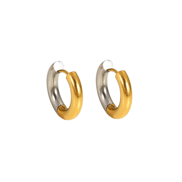 Create a unique look with our Twisted Hoop Earrings! These versatile earrings give the appearance of a double piercing, making them perfect for everyday wear. With their cute and stylish design, you'll be sure to turn heads. Elevate your style with these must-have earrings.



18K Gold Plated over 316L Stainless&nbsp;

Hypoallergenic, waterproof, tarnish free. Made to last.