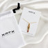 Waterproof non tarnish gold pendant necklace featuring five colorful bezel-set cubic zirconia stones.