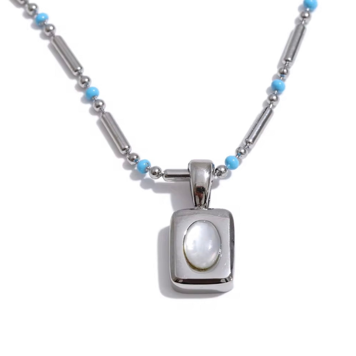 Silver April necklace with turquoise beads and small pendant