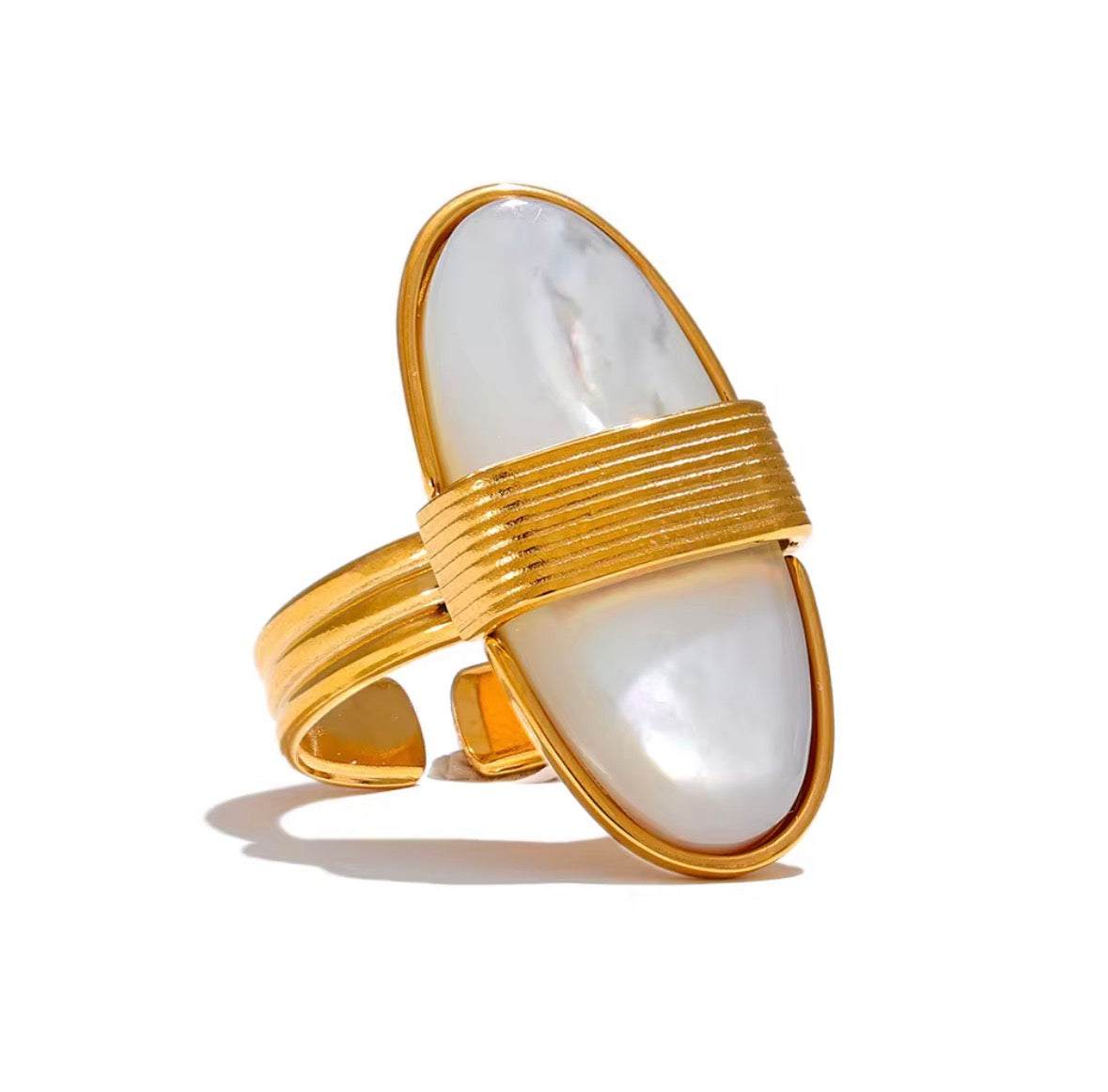 Rada ring close-up iridescent mother of pearl gold setting