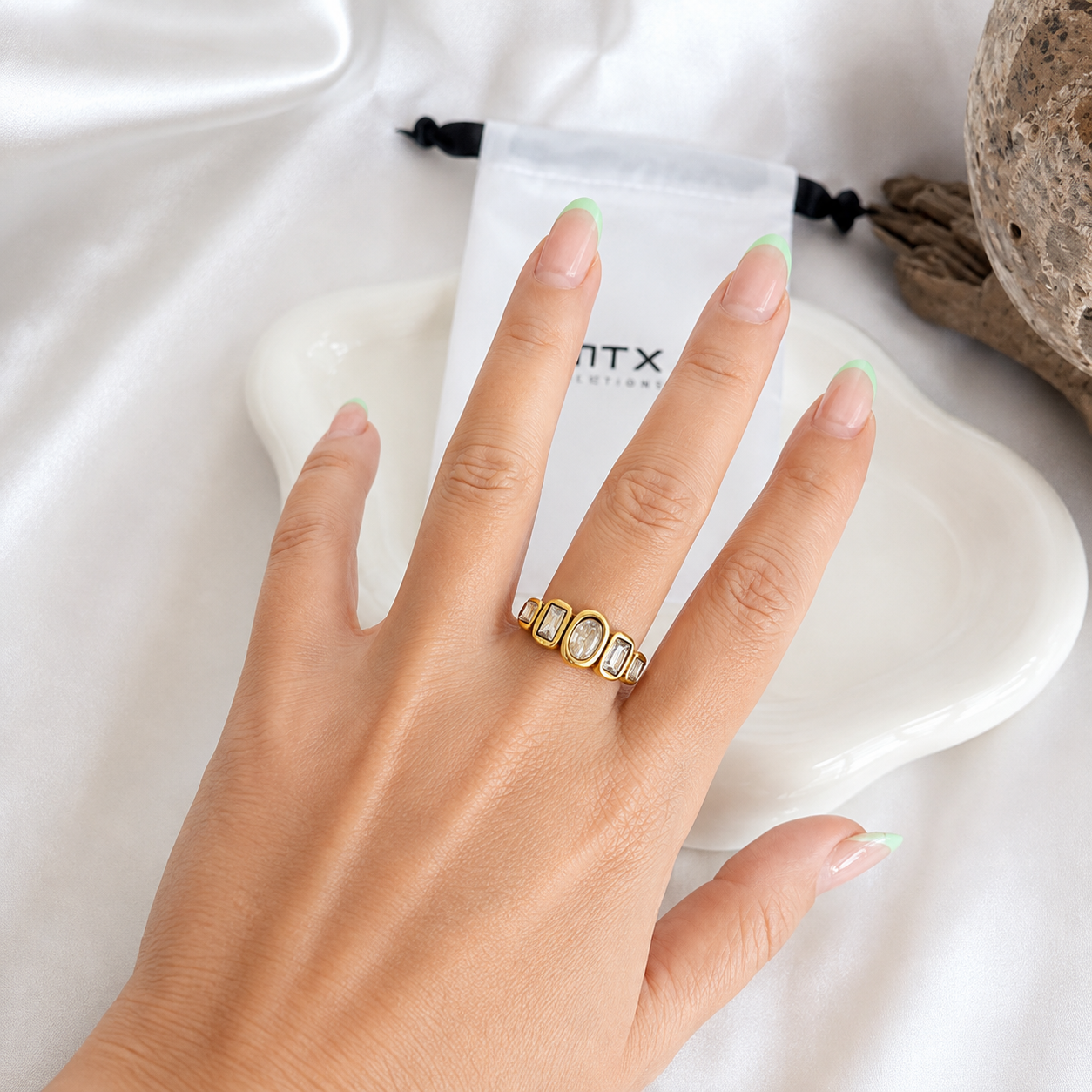 Sadie five-stone statement ring in silver stainless steel worn on hand