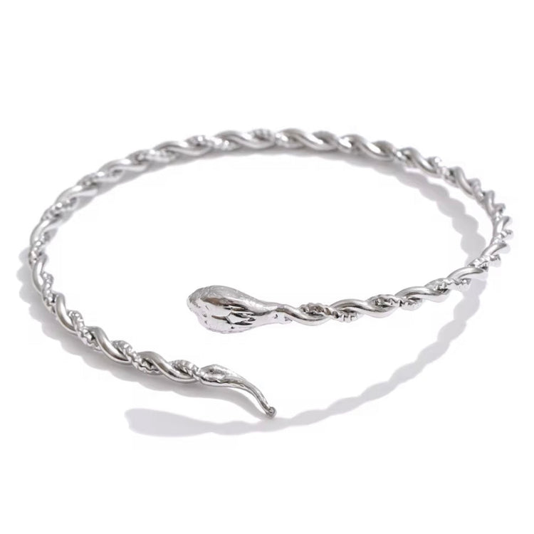 Silver snake bangle bracelet made from polished stainless steel with an open cuff design