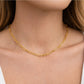 Model wearing the Sorelle short gold paperclip chain necklace designed for everyday layering.