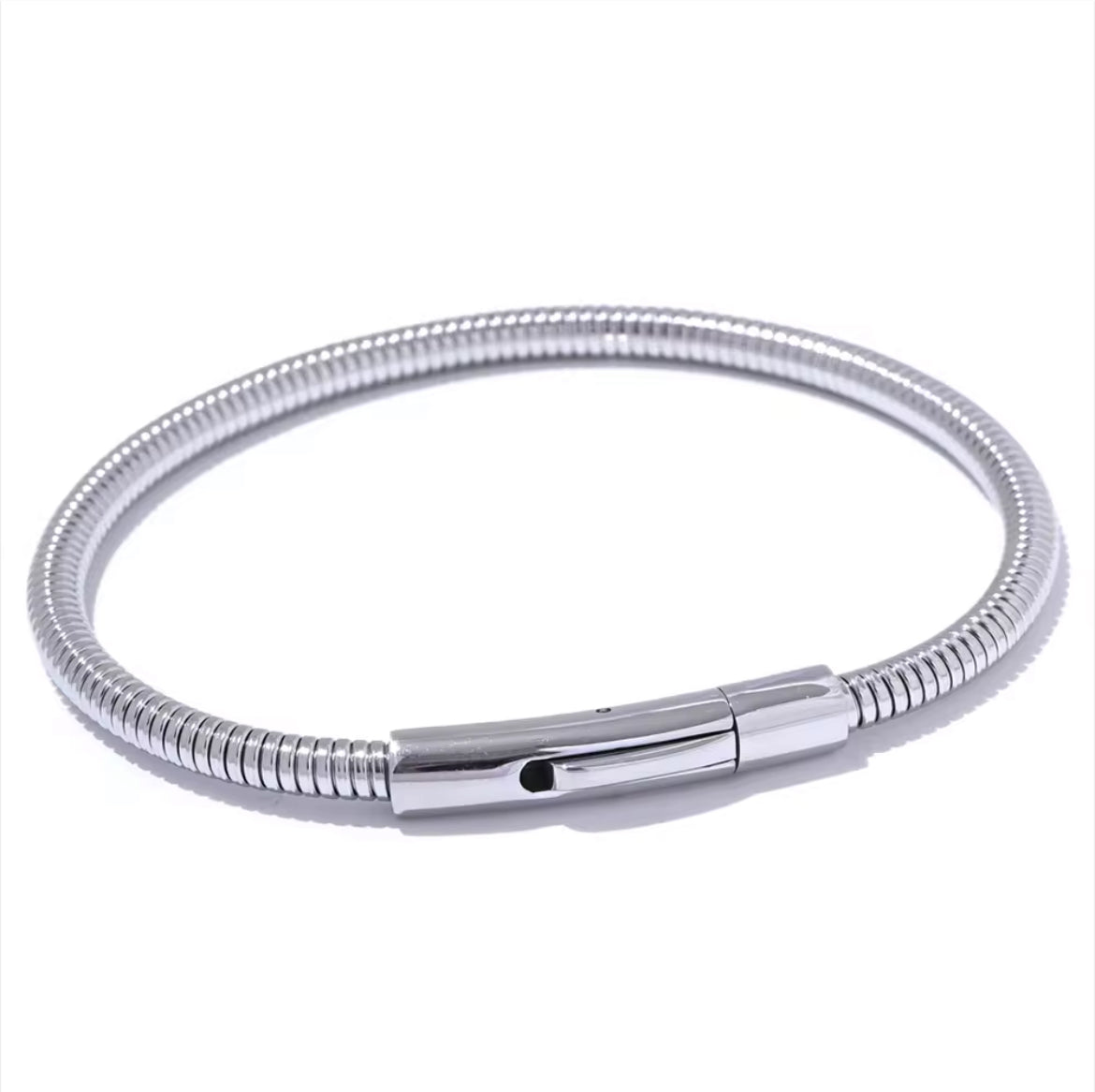 Introducing the Ava Cord Bangle Bracelet - a sleek and modern accessory that effortlessly adds a chic touch to any outfit. Made with a flexible cord design, this bracelet is both stylish and comfortable to wear. Elevate your look with this versatile and sophisticated piece.

 

This piece is made to last, hypoallergenic  & waterproof.

316L Stainless Steel 18K Gold Plated

Max fit 7inches / Link 5mm wide
