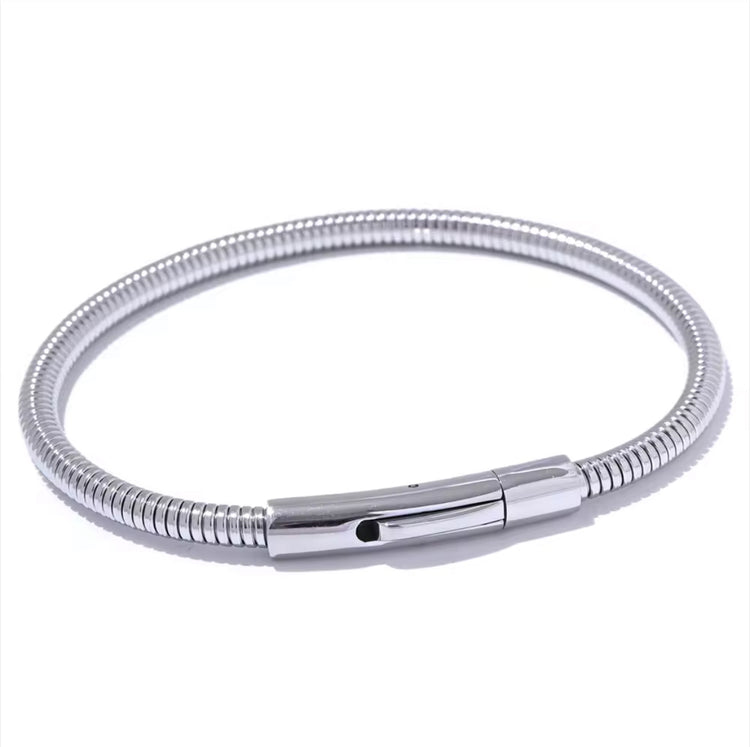 Introducing the Ava Cord Bangle Bracelet - a sleek and modern accessory that effortlessly adds a chic touch to any outfit. Made with a flexible cord design, this bracelet is both stylish and comfortable to wear. Elevate your look with this versatile and sophisticated piece.

 

This piece is made to last, hypoallergenic  & waterproof.

316L Stainless Steel 18K Gold Plated

Max fit 7inches / Link 5mm wide