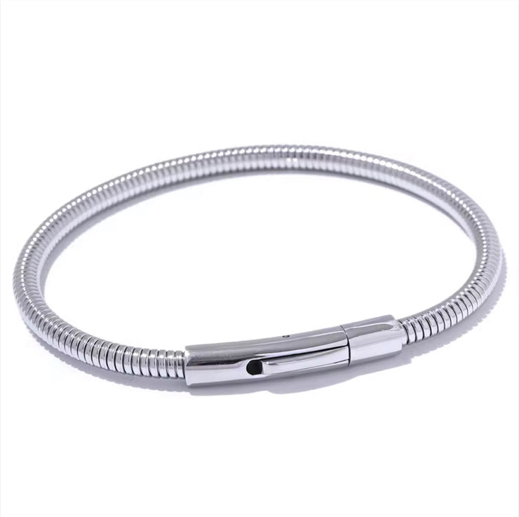 Introducing the Ava Cord Bangle Bracelet - a sleek and modern accessory that effortlessly adds a chic touch to any outfit. Made with a flexible cord design, this bracelet is both stylish and comfortable to wear. Elevate your look with this versatile and sophisticated piece.

 

This piece is made to last, hypoallergenic  & waterproof.

316L Stainless Steel 18K Gold Plated

Max fit 7inches / Link 5mm wide