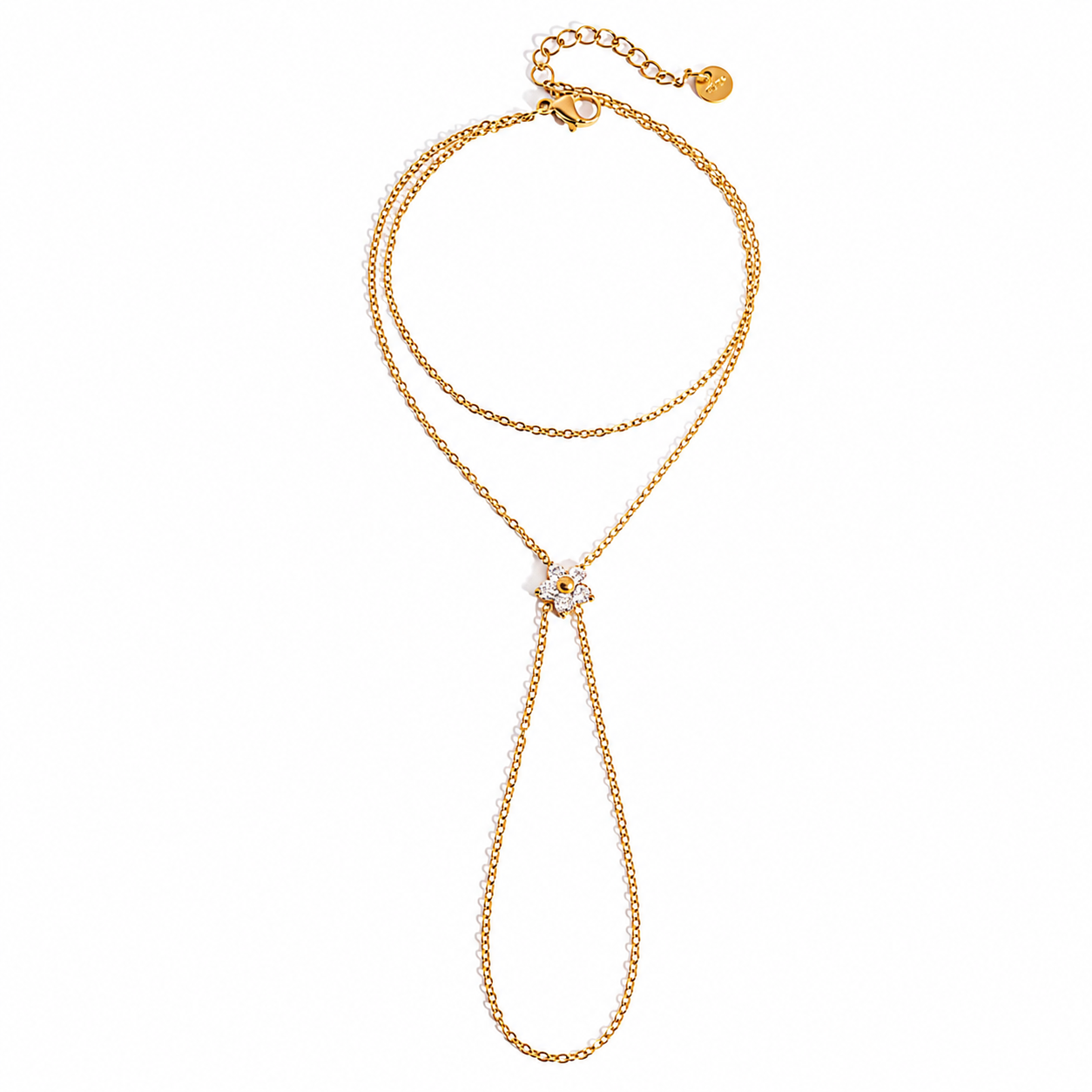 Single Flower Hand Chain featuring an adjustable bracelet and ring connected by a sparkling cubic zirconia flower crafted from 18K Gold PVD-plated stainless steel