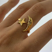 This Moon &amp; Star Open Ring combines a mystical and trendy design that is both cute and water resistant. Made from high-quality materials, this ring is perfect for any occasion and brings a touch of magic to any outfit. Add this unique piece to your collection and stand out with its enchanting charm.

Fit Size 7-8 , adjustable&nbsp;

18k Gold over Stainless Steel - Made to last!

Hypoallergenic, Tarnish free Shower &amp; Beach Friendly