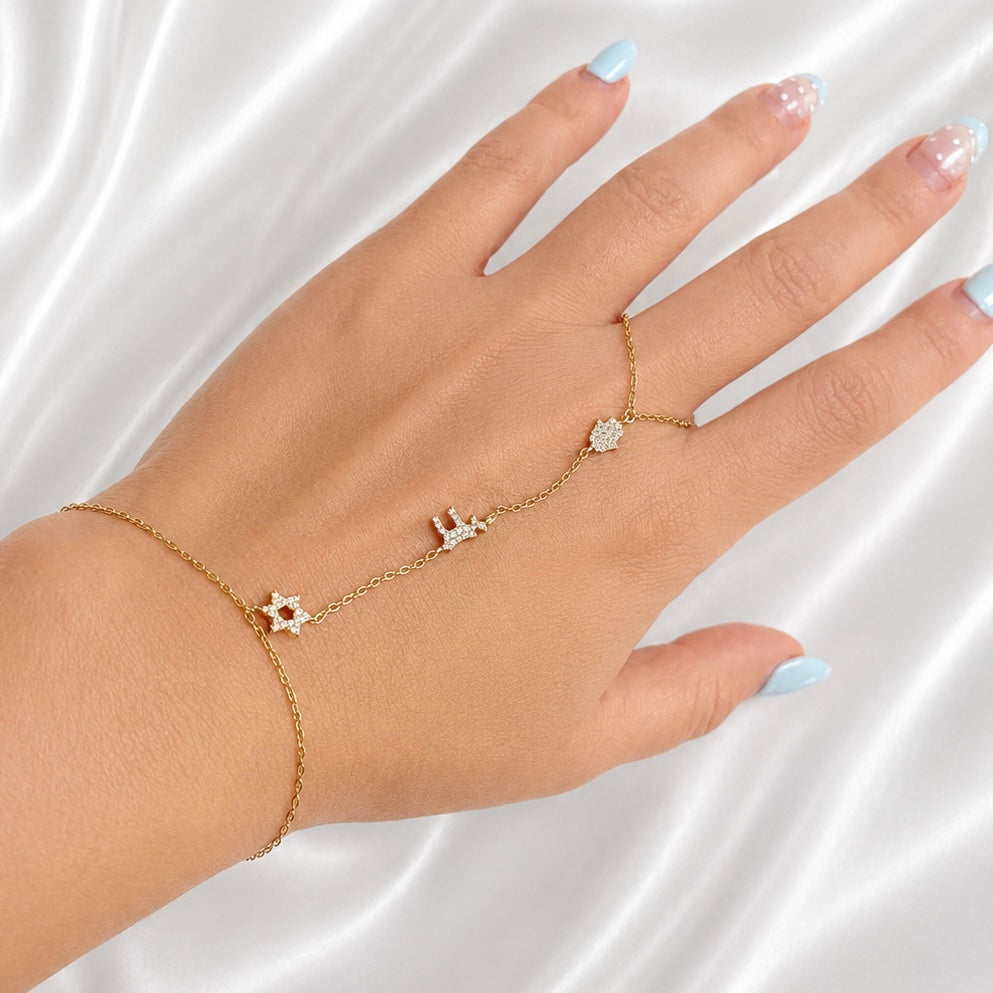 Woman wearing Sterling Silver Star of David Hamsa and Chai Hand Chain Bracelet