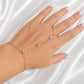Woman wearing Sterling Silver Star of David Hamsa and Chai Hand Chain Bracelet