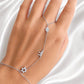 Woman wearing Sterling Silver Star of David Hamsa and Chai Hand Chain Bracelet in silver