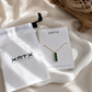 Three Green Stones Necklace presented on XMTX Collections jewelry card with white satin pouch