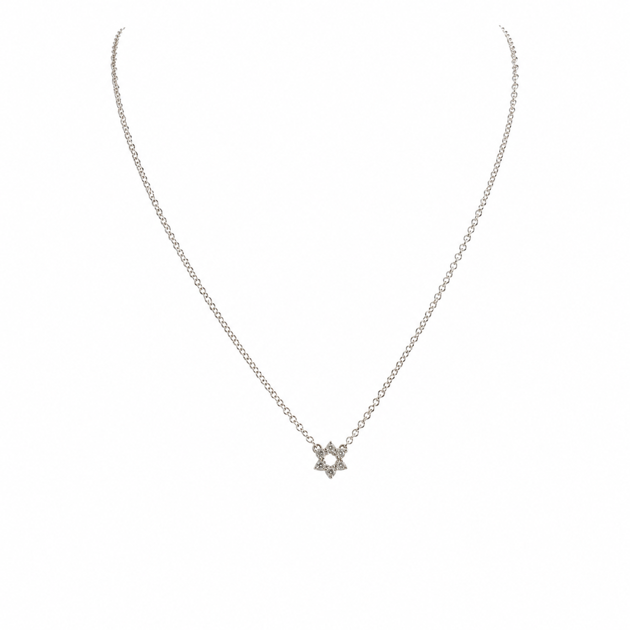 Tiny pavé Star of David necklace in sterling silver with sparkling cubic zirconia stones on a delicate chain.