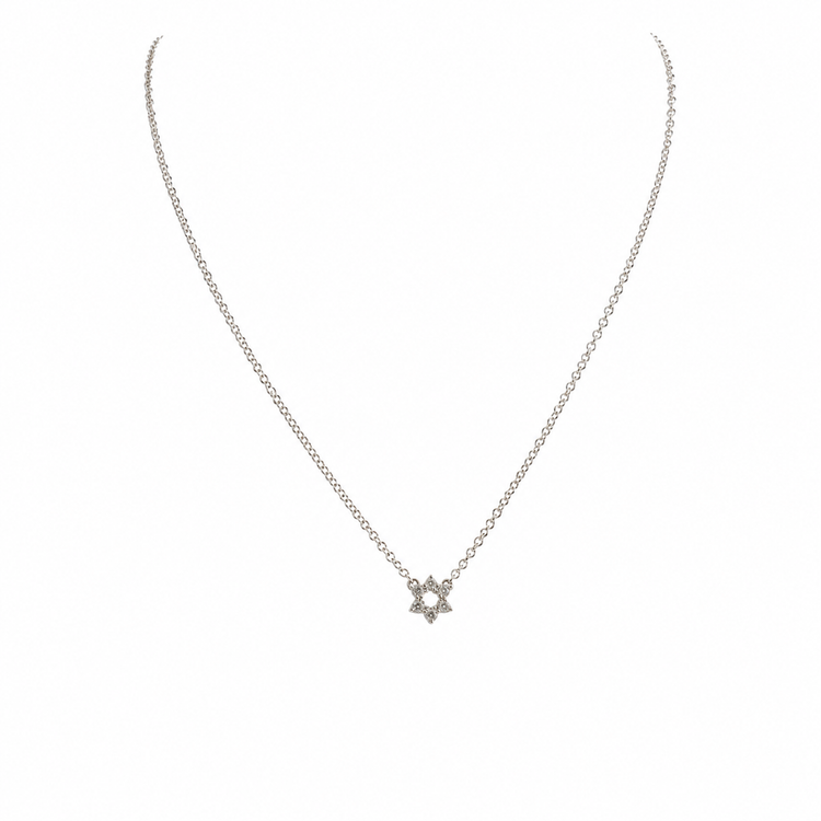 Tiny pavé Star of David necklace in sterling silver with sparkling cubic zirconia stones on a delicate chain.