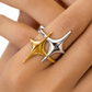 Model wearing a two-tone gold and silver open statement ring