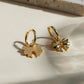 Embrace the latest trend with our must-have Bow Huggies Earrings. These cute accessories add a touch of charm to any outfit. Expertly crafted and designed to hug the ear, they are the perfect addition to your jewelry collection.

Made to last!&nbsp;Tarnish and Water Resistant, Beach &amp; Shower friendly, Hypoallergenic

.82" total length from the hoop the the tip of the bow

18K Gold Plated over 316L Stainless Steel base