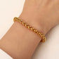 The Paola Bracelet boasts a timeless woven design and is crafted to resist tarnishing, ensuring its elegance and quality lasts for years to come. Exude sophistication and effortless style with this beautiful accessory.



316L Stainless Steel 18K PVD Gold Plated

6.5 inches long +2" inches ext