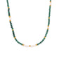Malachite and freshwater pearl necklace with green beads and gold accents on white background