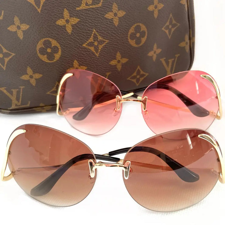 Showstopper Round oversized sunglasses XMTX Collections